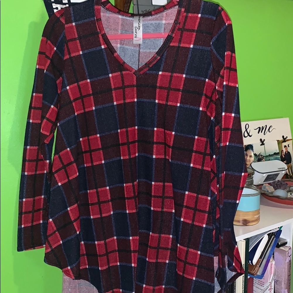 Blue red, white and black checkered t-shirt.